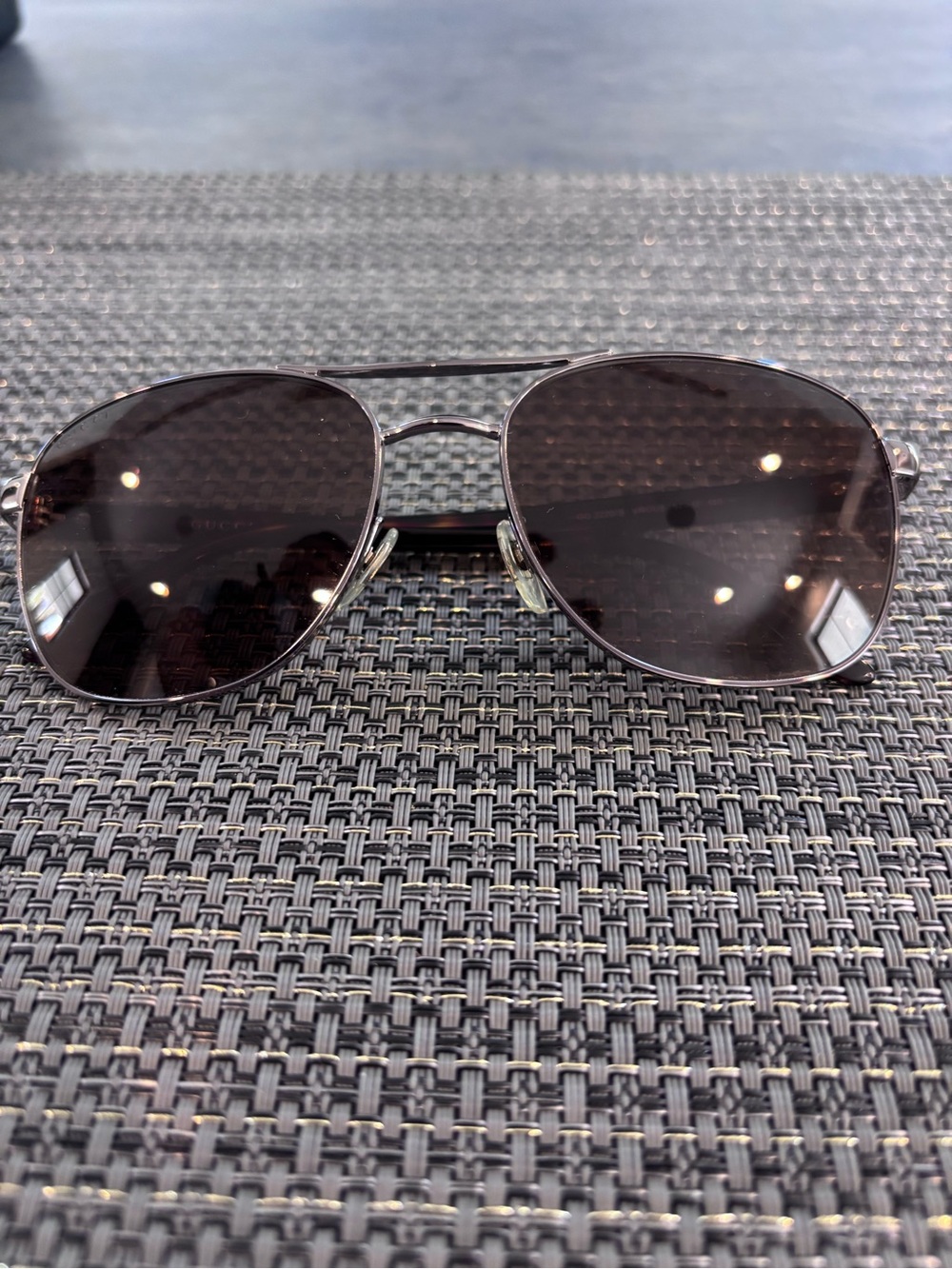Gucci Silver Frame gun metal Lens Aviator Sunglasses with tortoise pattern.